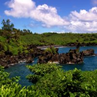 Beach in Hana with green trees