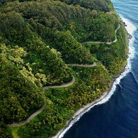 Green mountain on beach in Hana