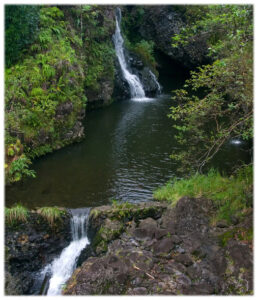 A pool at the base of a waterfall on the Road to Hana.